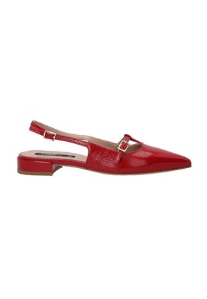 Red patent leather slingback shoe with a pointed toe, small block heel, and decorative cutout detail with a buckle closure.