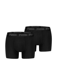 Schwarze Boxer-Shorts mit einem elastischen Bund und "PUMA"-Logo. Hergestellt aus einem weichen, dehnbaren Material für Komfort und Unterstützung.