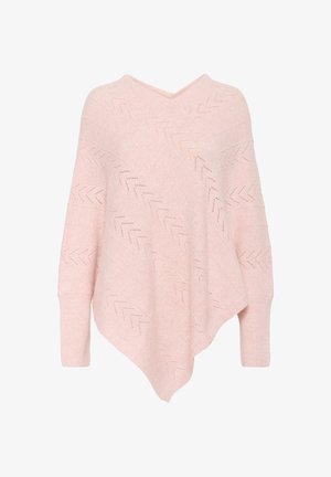 Pale pink knit poncho with a V-neck, featuring a zigzag pattern and ribbed cuffs. Soft texture and asymmetrical hem design.