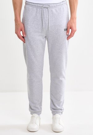 BRUTUS - Pantalones deportivos - grau