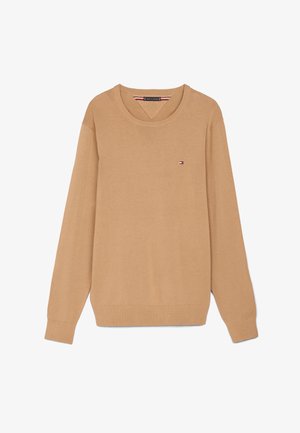 Light brown knitted sweater with long sleeves, crew neck, and small logo accent on the chest. Soft texture and casual design.