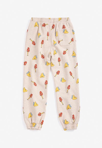Pantalon beige pour enfants avec taille et poignets élastiques, avec un motif coloré de champignons et de triangles jaunes, et une poche arrière sur le côté droit.