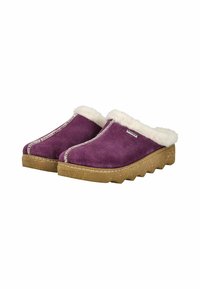 Zuecos de ante morado con forro de piel blanca, presentando una suela de corcho con zigzag y costuras prominentes a lo largo de los bordes.