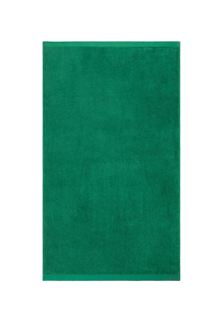Serviette en coton vert avec une texture douce et un design uni. Fini avec une bordure verte assortie le long des bords.