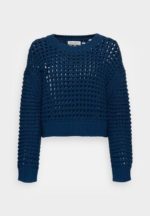 Pull court en maille bleu marine avec motif ajouré, col rond côtelé, poignets et ourlet.