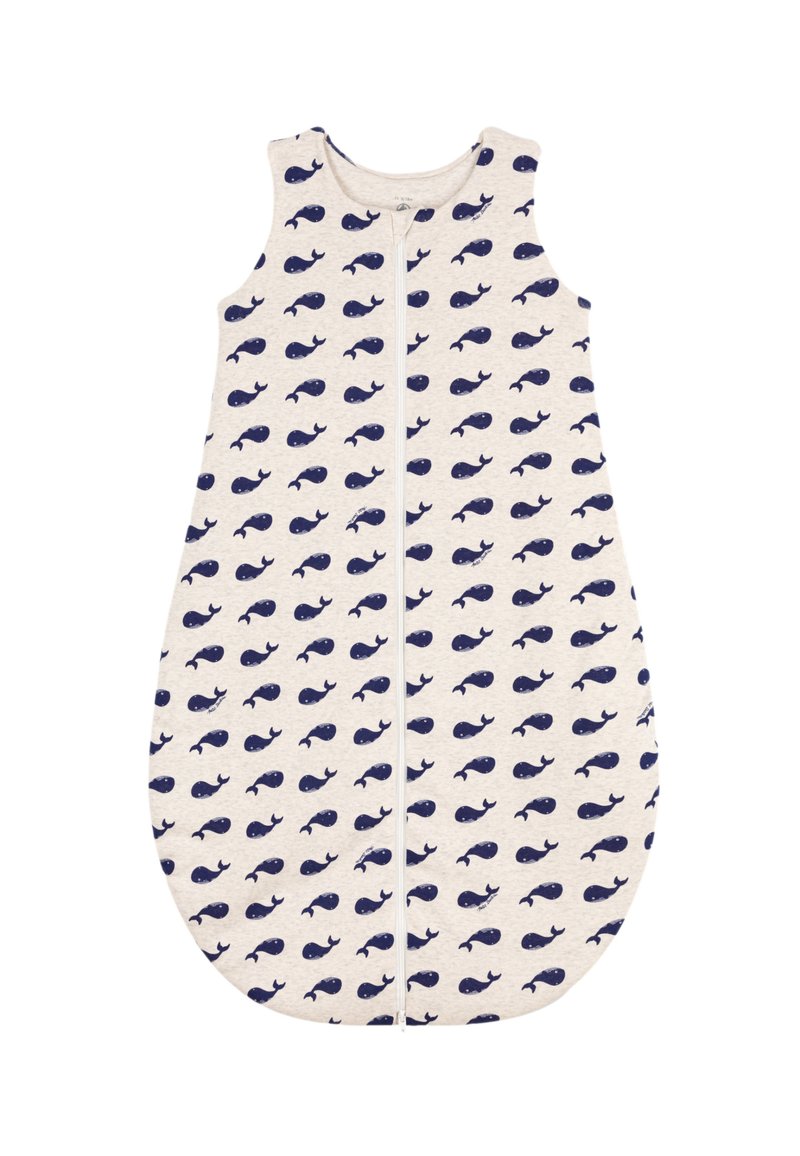 Miegmaišis smėlio spalvos audinyje su tamsiai mėlynu banginio raštu. Turi centrinį užtrauktuką ir be rankovių dizainą. Minkšta, apvali forma.