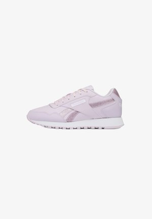Light pink sneakers made of synthetic material, featuring a shiny side accent, lace closure, and white rubber sole.
