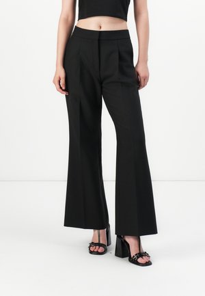 HAMAIA - Trousers - black