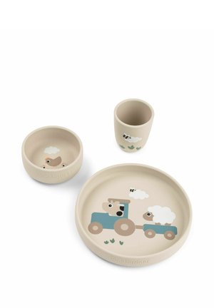 Ensemble de vaisselle trois pièces en beige doux avec motifs d'animaux. Comprend une assiette, un bol et une tasse. Matériau durable et léger.