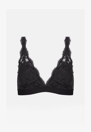 Bralette en dentelle noire avec motif floral, décolleté plongeant, larges bretelles en dentelle et une bande noire lisse en bas.