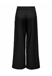 Zwarte wijde broek met een elastische tailleband, met een gladde textuur en eenvoudig ontwerp, geschikt voor zowel casual als formele gelegenheden.