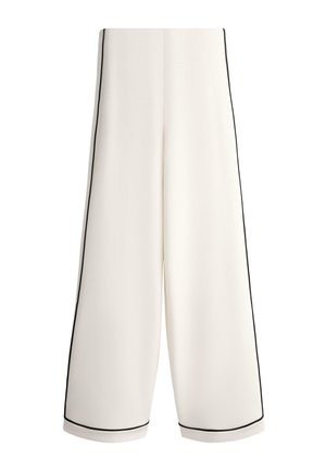 Biele nohavice s širokými nohavicami s čiernym lemovaním pozdĺž strán a okrajov, s vysokým pásom a čistým, minimalistickým dizajnom.