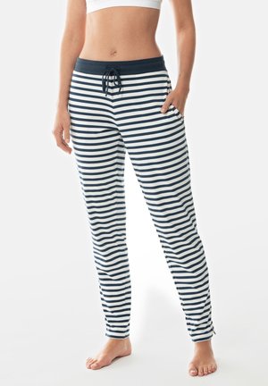 Pantalons de lounge rayés en tissu doux, avec une taille bleu marine, des liens à nouer et des poches latérales, offrant une coupe décontractée.
