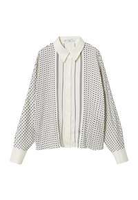 White button-up shirt featuring black dot pattern, vertical stripes, long sleeves, and collar. Made of lightweight fabric with textured detail.