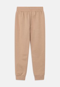 adidas Originals JUNIOR UNISEX - Pantalon de survêtement - magic beige