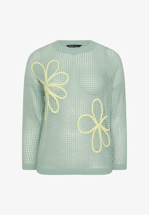 Lysegrøn åben strikket sweater med lange ærmer, med to store blomsterdesigns med gul kontur foran.