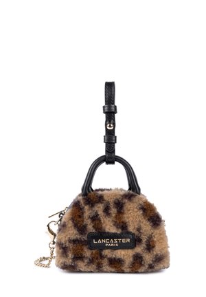 Leopard print handbag with black leather handles, soft fur texture, gold-tone hardware, and a rectangular logo patch on the front.