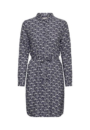 Robe chemise à imprimé géométrique bleu marine et blanc avec manches longues, col, boutons sur le devant et ceinture nouée à la taille.