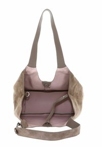 Beige Wildleder-Handtasche mit weicher Haptik, rosa Innenseite, zwei Fächern und einem breiten, flachen Leder-Schultergurt. Magnetverschluss.