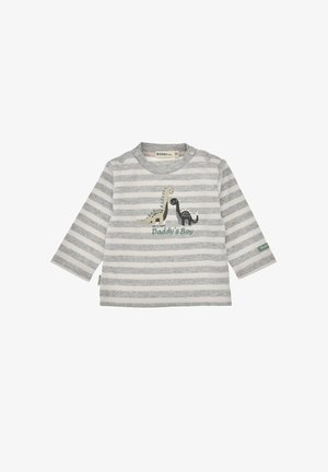 Maglietta a maniche lunghe grigia e bianca a righe con dinosauri ricamati e la scritta "Il ragazzo di papà". Presenta bottoni a pressione sulla spalla.