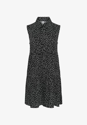 Robe noire sans manches à pois blancs, col chemise, boutonnée devant et jupe à volants.