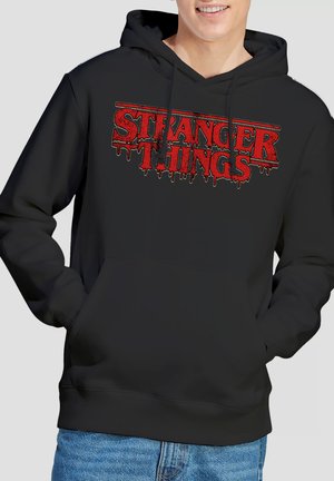 NETFLIX, STRANGER THINGS  RETRO DRIPPY LOGO - Kapuzenpullover - black