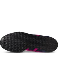 Black rubber sole with textured surface, featuring pink and navy accents and a streamlined design. No visible logos or patterns.