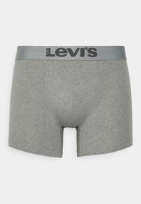 Szürke pamut boxer alsónadrág fekete Levi's logóval ezüstszínű derékkal, testhezálló kialakítással és puha textúrával.