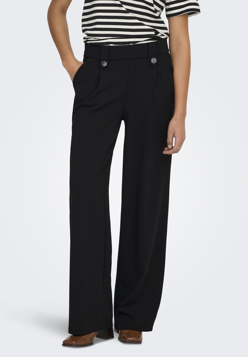 Sorte bukser med vide ben lavet af glat stof, med høj talje, to forlommer og dobbeltknap-lukning.