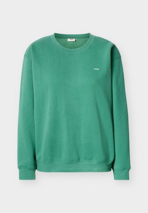 Πράσινο φούτερ από απαλό ύφασμα, με στρογγυλή λαιμόκοψη και μακριά μανίκια. Μικρή ετικέτα ραμμένη στο στήθος, απλός σχεδιασμός.