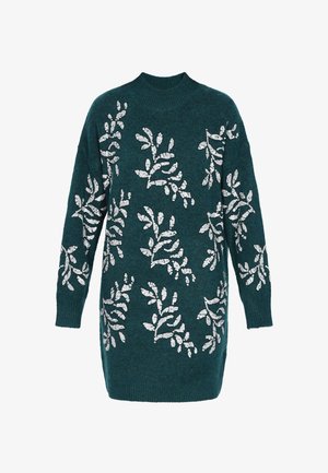 Teal sweater med lange ærmer, høj hals og sølvblad-mønstrede udsmykninger over det hele. Strikket tekstur, oversized pasform.