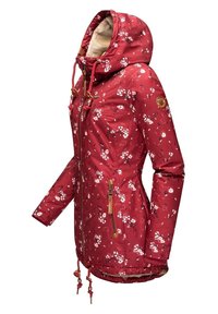 Röd blommönstrad jacka med huva, dragsko, framfickor med dragkedja och ribbstickade ärmslut, tillverkad av ett slätt, lätt tyg.