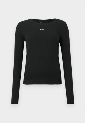 Μαύρο εφαρμοστό τοπ με μακριά μανίκια από ριμπ ύφασμα, με στρογγυλή λαιμόκοψη και λεπτό λευκό λογότυπο Nike στο στήθος.