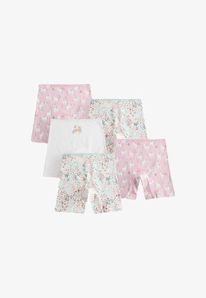 Viis paari laste lühikesi pükse ja seelikuid pastelltoonides, millel on ükssarviku ja lillemustrid, seatud valgele taustale.