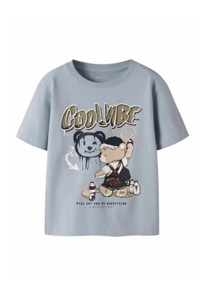 Light blue children's T-shirt with a teddy bear spray-painting a black bear face and the text "Cool Vibe" and "Will get you do everything."