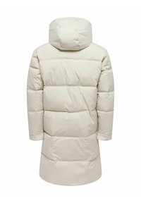 Lichtbeige pufferjack met een capuchon, oversized pasvorm, een gestikte uitstraling en lange mouwen. Gladde, waterafstotende stof.