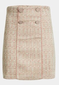 Vaatteet polvipituisessa vaaleanpunaisessa tweed-hameessa on teksturoitu, kudottu kangas, jossa on kaksi koristeellista nappia ja kanttaus saumoissa.