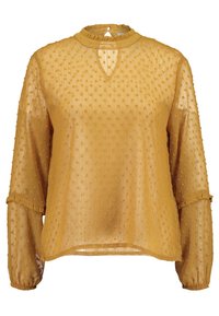 Keltainen sheer-blouse, jossa on teksturoituja pilkkuja, pitkät hihnat, rypytetty korkea kaulus ja avaimenreikäpainike takana.