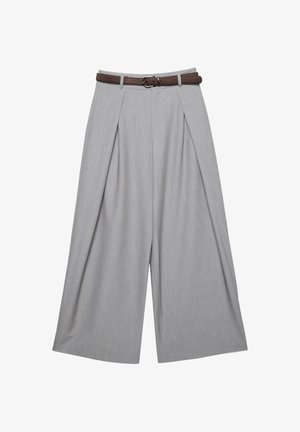 - Spodnie materiałowe