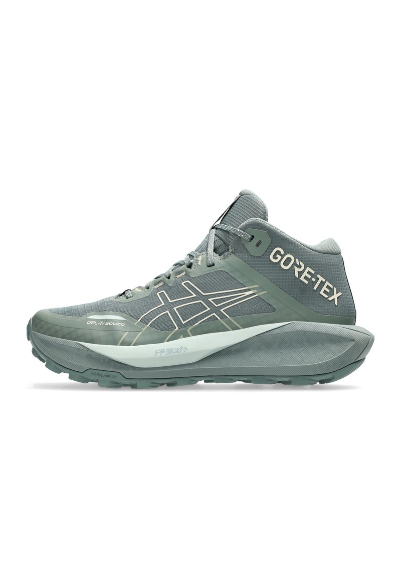 Goodyear hiking shoes featuring a textured, greenish-grey mesh upper, GORE-TEX branding, and a lightweight, cushioned sole with traction pattern.