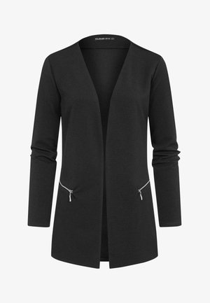 Cardigan noir en tissu texturé, avec un col en V, des manches longues et deux poches zippées à l'avant. Design à l'avant ouvert.