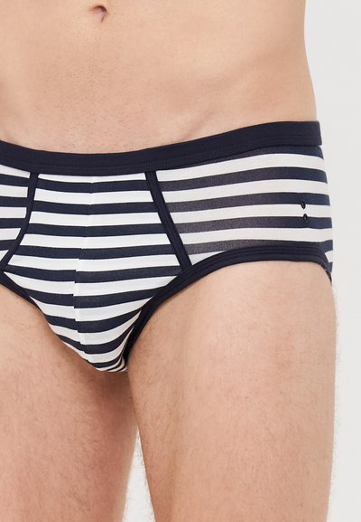 Gestreifte Slips mit navy-blauen und weißen horizontalen Streifen, elastischem Bund und glatter Textur. Entworfen für Komfort und Passform.