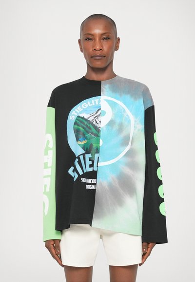 Long-sleeve t-shirt with a black and blue gradient design. Features green accents and a circular graphic with mountain imagery and text.