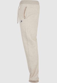 Beige sweatpants van zacht materiaal, met een trekkoord in de taille, zijzakken en een klein logo op de bovenbeen.