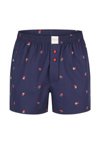 Marinblå kalsonger i tyg med ett mönster av röda och gröna jordgubbar, med två röda knappar och resårmidja.