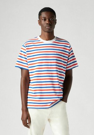 Striped t-shirt in white, featuring red and blue horizontal stripes. Crew neck design with a small "Paris" embroidery on the chest.