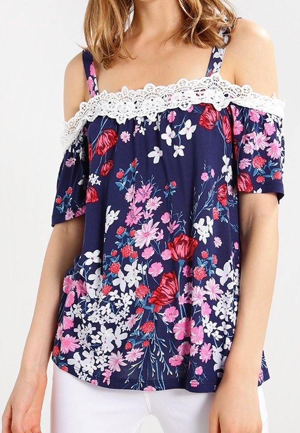 Navy floral blouse with off-shoulder design, featuring white lace trim. Patterns include red and pink flowers on a dark background. Short sleeves.