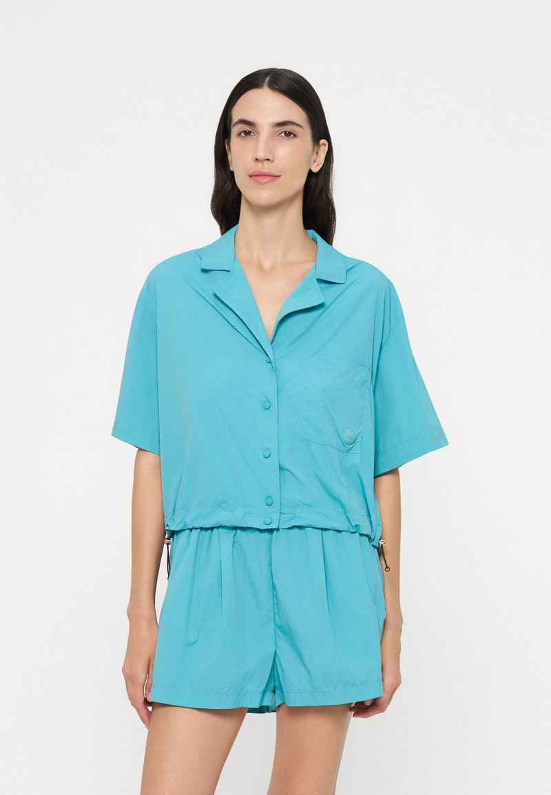 Camisa