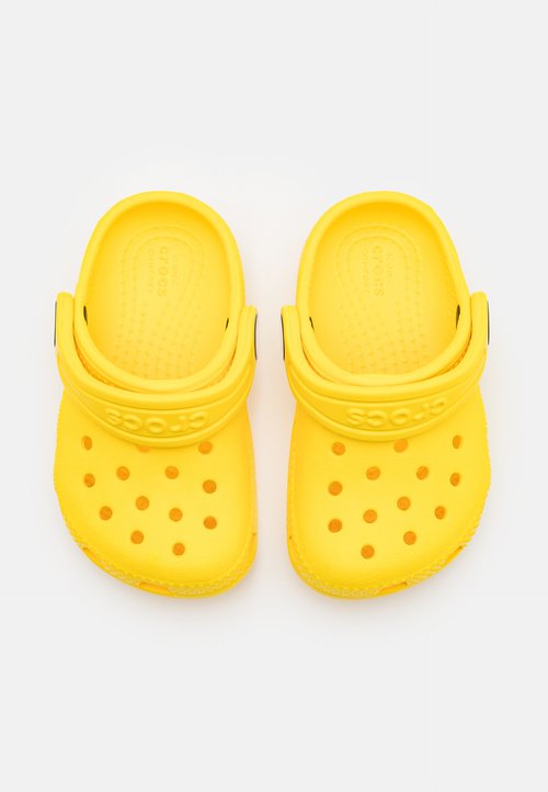 Crocs CLASSIC UNISEX - Sandalias planas - lemon — foto 4