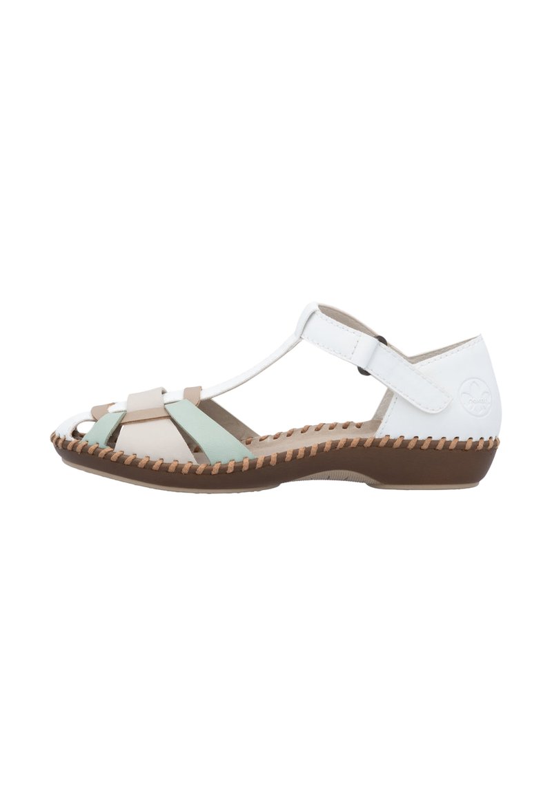 Sandale à lanières en blanc, beige et vert menthe. Fabriquée en matériaux syntétiques, elle possède un petit talon et une semelle marron cousue. Bride de cheville réglable.